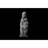 A CARVED STONE FIGURE OF THE MADONNA AND CHILD, PROBABLY 11TH CENTURY BYZANTINE carved in the
