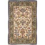 A FINE PART SILK QUM RUG, CENTRAL PERSIA approx: 5ft.5in. x 3ft.7in.(165cm. x 109cm.) The ivory