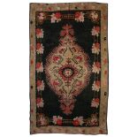 A KARABAGH KILIM, SOUTH CAUCASUS approx: 11ft.5in. x 6ft.7in.(347cm. x 201cm.) Black field with