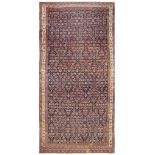 AN ANTIQUE NORTH-WEST PERSIAN KELLEH approx: 13ft.4in. x 6ft.6in.(406cm. x 196cm.) Very good type,