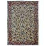 A TABRIZ CARPET, NORTH-WEST PERSIA approx: 12ft.11in. x 9ft.5in.(394cm. x 286cm.) The ivory field