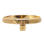 Hermes Kelly Cadenas Lock Bangle, yellow lizard skin detail with gold tone lock charm, 6.5cm