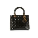 Christian Dior Medium Lady Dior, black quilted Cannage patent leather with gold tone hardware,