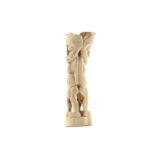 A BONE JANUS FIGURE Possibly of the Lega tribe, carved in hollow bone, formed of two stylised