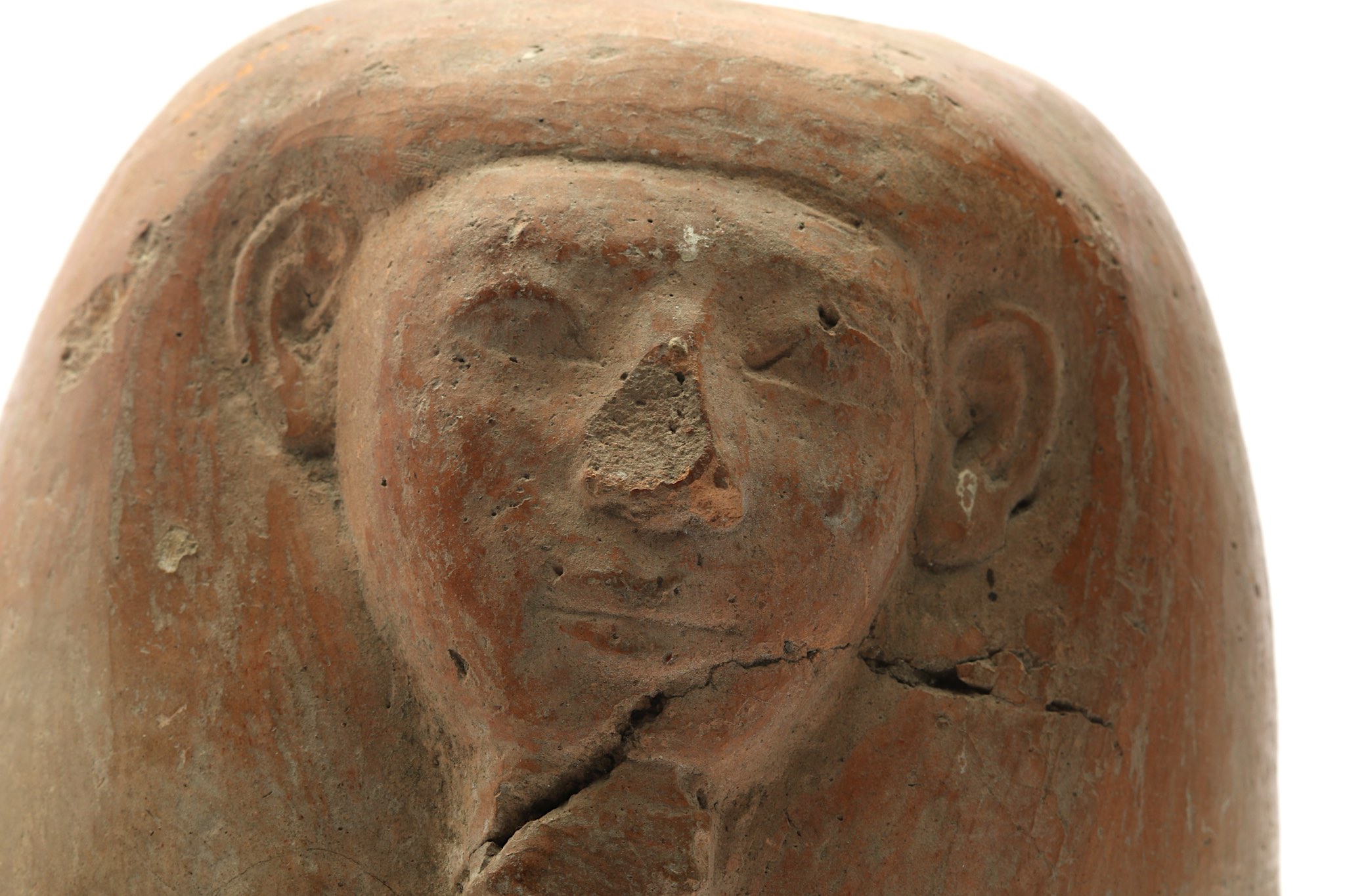 A TERRACOTTA CANOPIC JAR LID New Kingdom, Circa 1550 - 1070 B.C. Of human-headed Imsety, the - Image 5 of 6