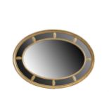 A Victorian oval giltwood and gesso marginal plate wall mirror, 19th Century, with gadrooned border,