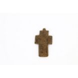 A small antique horn based cross of small size, possibly medieval, carved below with Jesus being