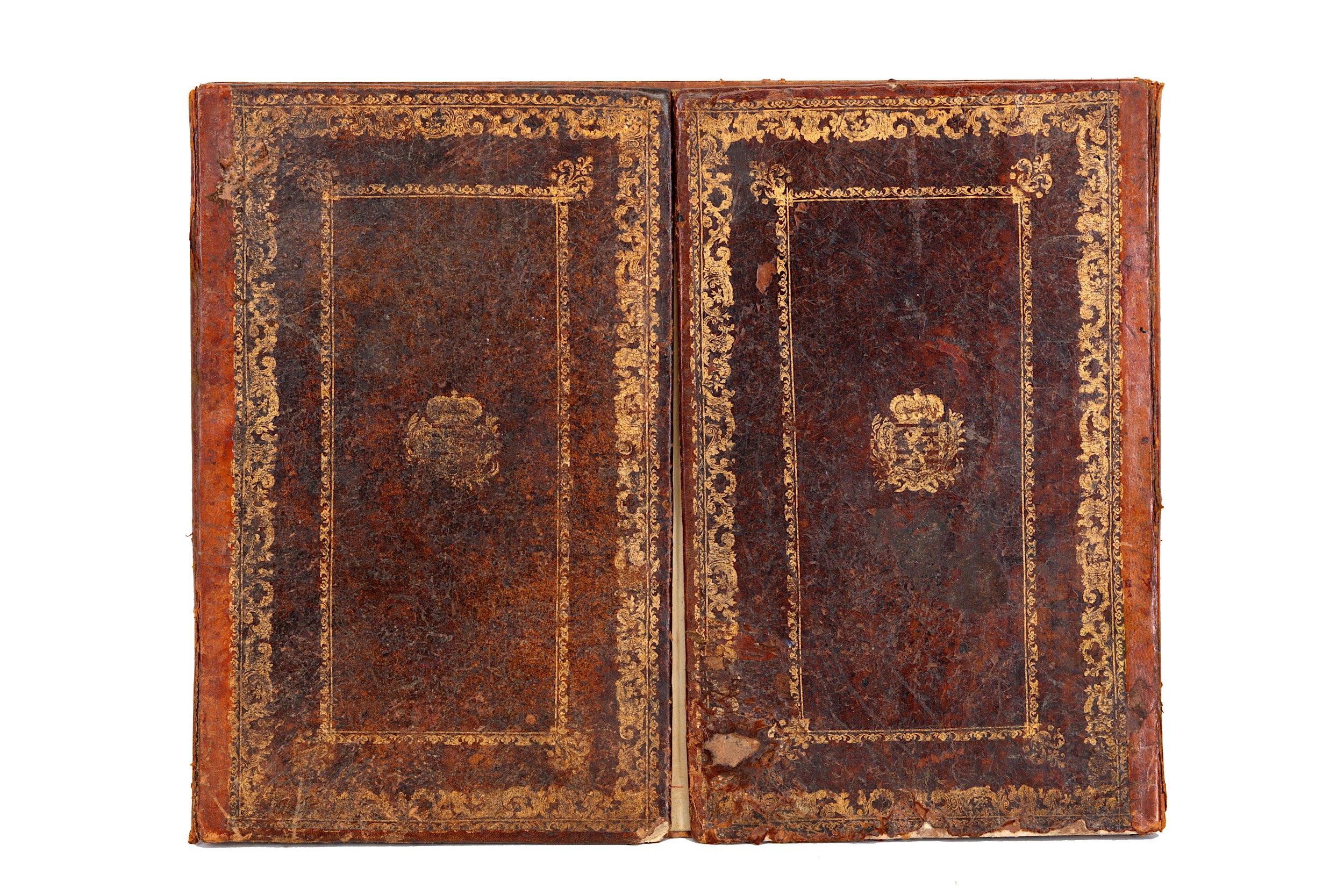 A tooled brown Morocco leather armorial blotter, early 20th Century, thegilt twin armorial by repute