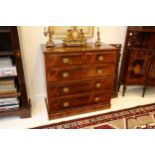 A late Victorian rosewood chest, fitted with two short and two graduated long drawers, on plinth