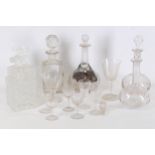 A collection of Victorian and later glass decanters, five modern silver decanter labels, four