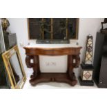 A Victorian mahogany serpentine front console or serving table, the white marble top over a frieze