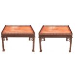 A pair of good quality reproduction Chippendale revival mahogany lamp tables, each with