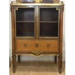 A fine French ormolu mounted kingwood and mahogany side cabinet in the manner of Francois Linke,