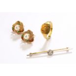 A small collection of jewellery, including a pair of ropetwist cultured pearl earclips, stamped 14K,