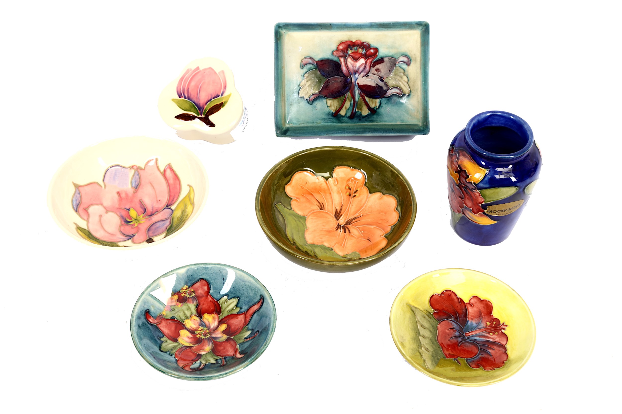 A collection of various Moorcroft pottery items, mid-20th Century and later, to include four small