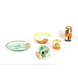 A collection of Clarice Cliff ceramics, early 20th Century, to include an unusual Clarice Cliff vase