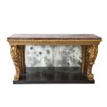 An English carved giltwood console table, circa 1830, the variegated marble top on bold Acanthus