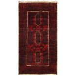 A Balouch rug, north-west Persia, approx: 7ft.8in. x 4ft.2in. (234cm x 127cm) The field with various