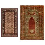 A Turkish prayer rug and a Balouch rug, approx: 5ft.5in. x 3ft.8in. and 4ft.6in. x 2ft.7in.  Both