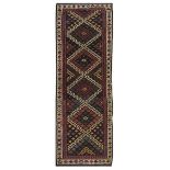 An antique Kurdish narrow Kilim, approx: 10ft.9in. x 3ft.9in. (326cm x 114cm) Classic design with