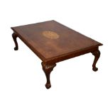 A good reproduction rectangular walnut coffee table, the satinwood crossbanded top with central oval