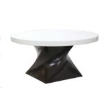 A contemporary dining table by Robert Kuo, with a circular white lacquered top, on a twisted form