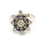 A diamond and sapphire cluster ring, French assay mark, maker's mark, ring size J