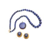 A lapis lazuli style necklace pendant and earrings