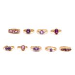 Nine amethyst rings, Two set with oval-cut amethysts in ropetwist collet-settings, seven accented by