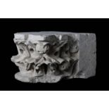 A FRENCH GOTHIC CARVED LIMESTONE CORBEL, POSSIBLY