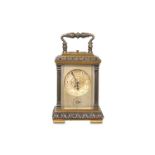 AN EARLY 20TH CENTURY GILT AND SILVERED METAL CARRIAGE CLOCK WITH ALARM AND REPEAT SIGNED 'TIFFANY &