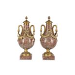 A PAIR OF LOUIS XVI STYLE GILT BRONZE AND BRECHE M
