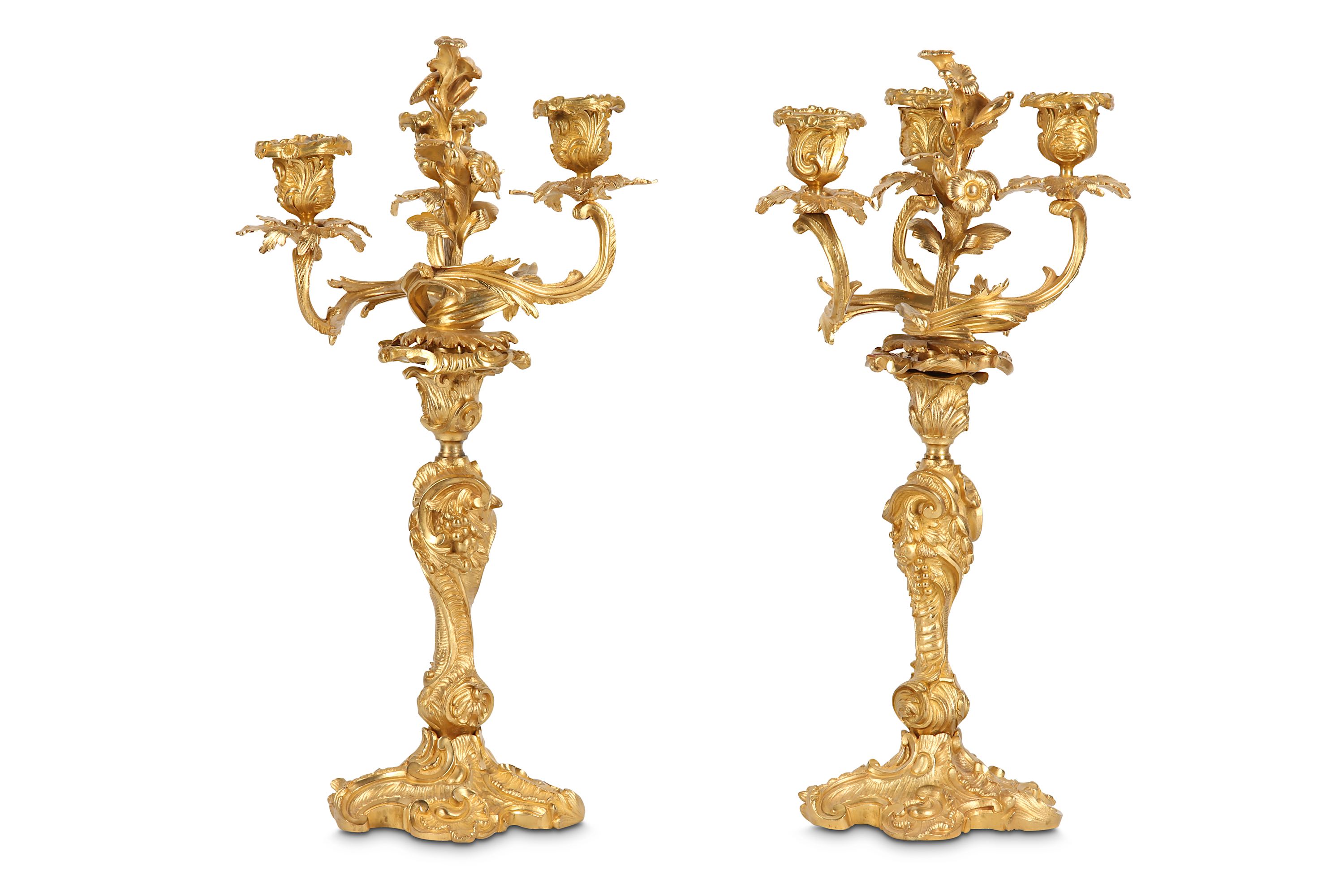 A PAIR OF LATE 19TH CENTURY FRENCH GILT BRONZE CAN