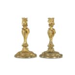 A PAIR OF MID 19TH CENTURY FRENCH GILT BRONZE CANDLESTICKS IN THE MANNER OF MEISSONIER  of Rococo