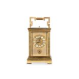 A LACQUERED AND GILT BRASS CARRIAGE CLOCK WITH ALA