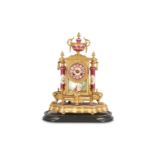 A LATE 19TH CENTURY FRENCH GILT METAL AND PINK PORCELAIN MOUNTED MANTEL CLOCK WITH GLASS DOME the