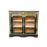 A THIRD QUARTER 19TH CENTURY FRENCH EBONISED AND CUT BRASS MOUNTED DISPLAY CABINET IN THE BOULLE