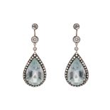 A pair of aquamarine and diamond earrings