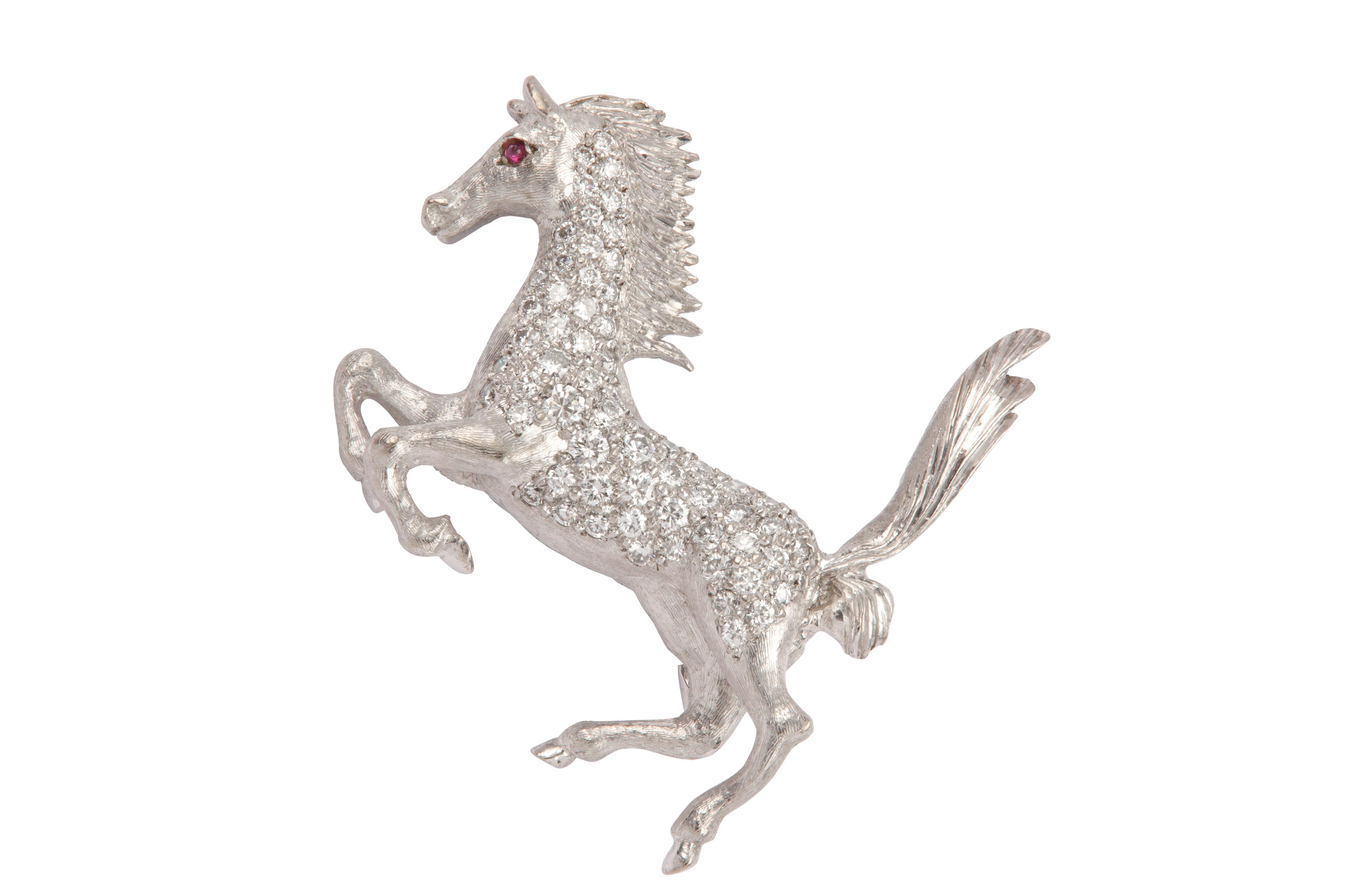 A diamond horse brooch