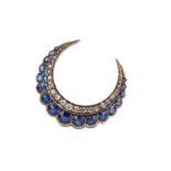 A sapphire and diamond crescent brooch, circa 1900