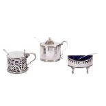 A mixed group of antique sterling silver condiment items, including a William IV mustard pot, London