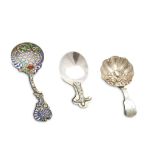 A mixed group of three antique silver caddy spoons, including an Elizabeth II example, London 1981,