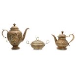 A late 19th/early 20th century Turkish silver matched three-piece tea and coffee service