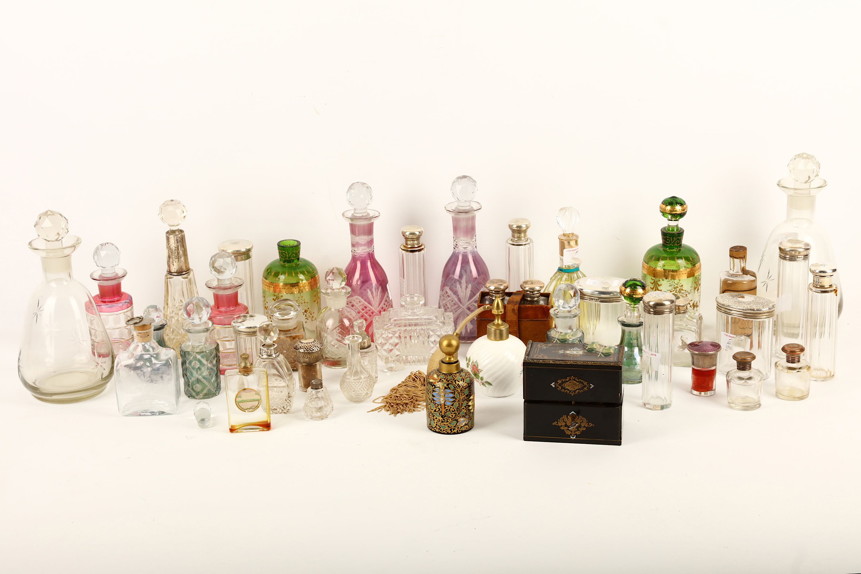 A large collection of various perfume and scent bottles, to include a French late 19th Century boxed