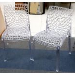 A pair of modern design perspex side chairs, with pierced seats and backs, 47cm deep (2)