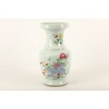 A Chinese famille rose vase, Qing dynasty, of baluster form with a trumpet neck, decorated to the