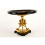 A Victorian black slate and gilt bronze tazza, 19th Century, the top dish with a central gilded