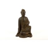 A bronze Buddhistic figure, late 19th or early 20th Century