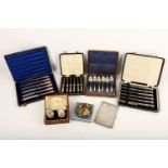 A mixed group of sterling silver, comprising a cigarette case, Birmingham 1919, a cased set of six