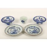 A collection of Chinese blue and white items, including two stem bowls painted with a lotus pond and